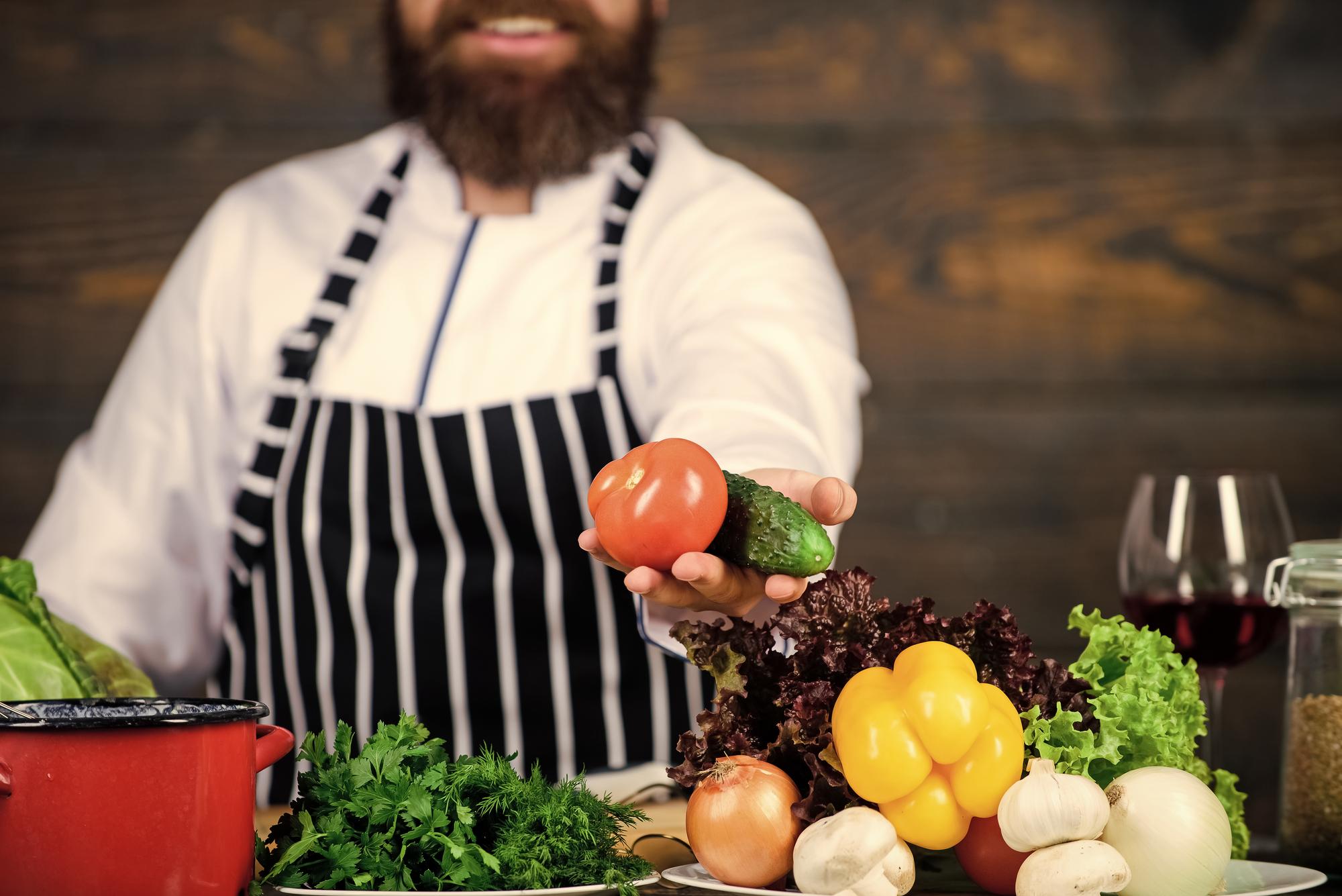 Artisan chef selecting produce at market